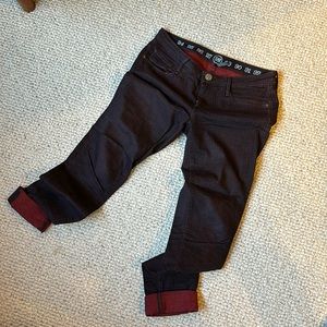 Plum, burnt red polka dot jeans.